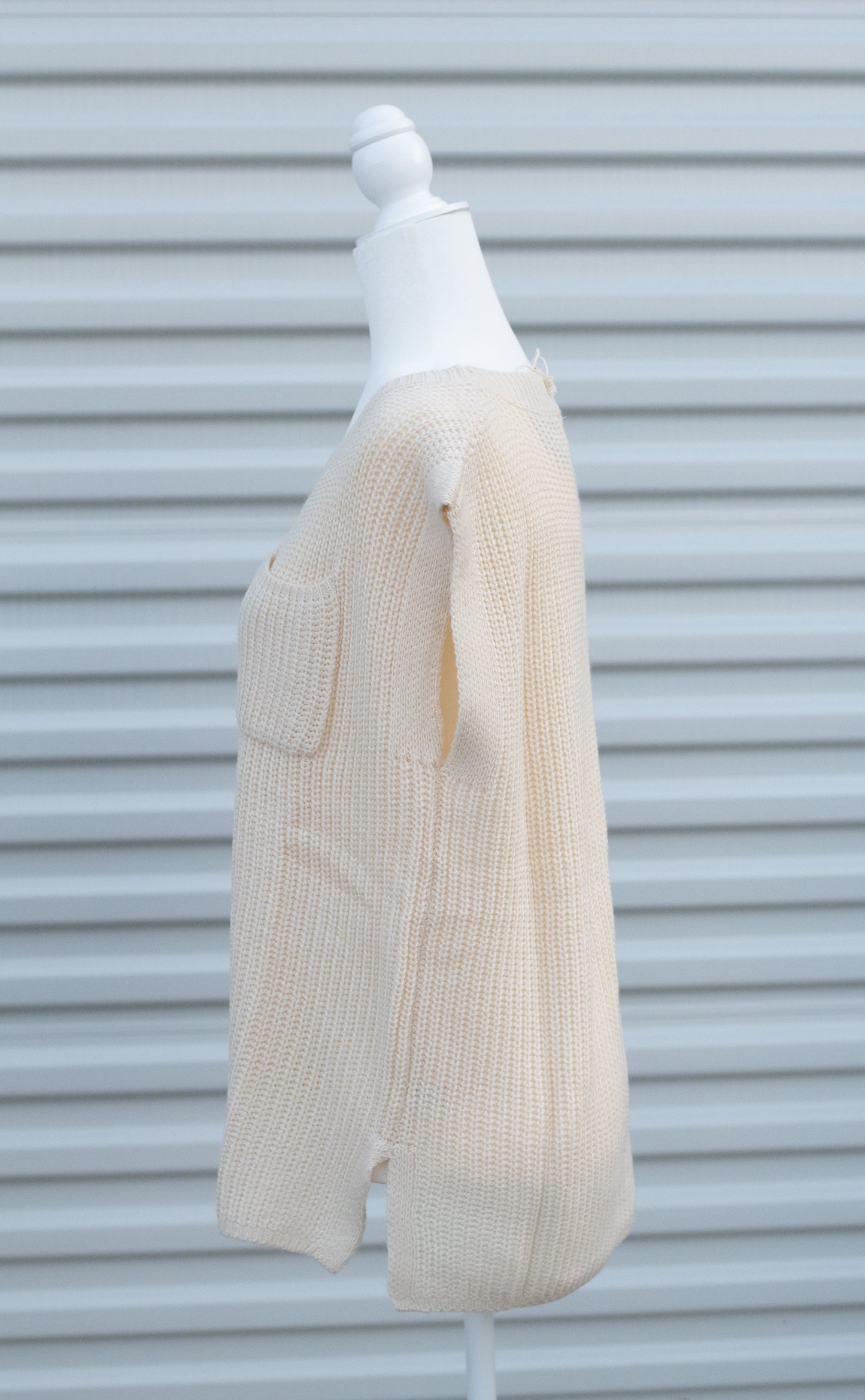 Ivory Sleeveless Sweater Top